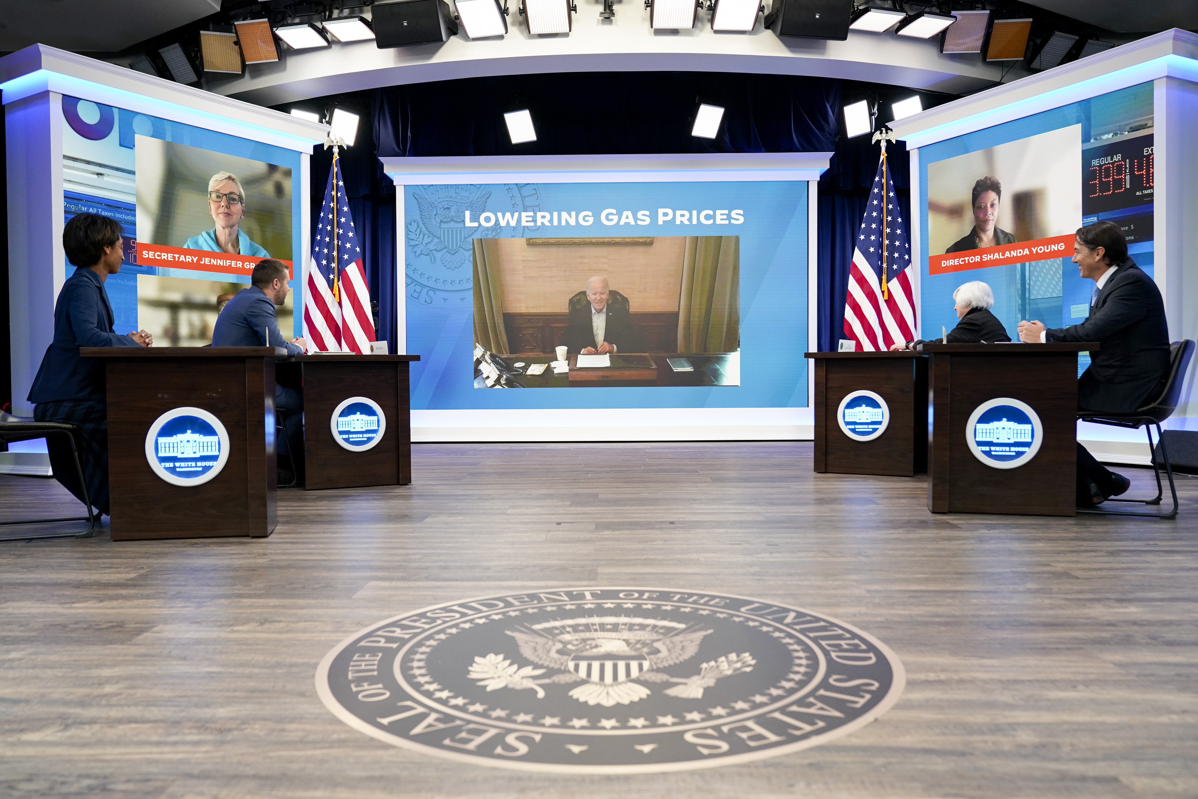 President Joe Biden speaks virtually during a meeting with his economic team in the South Court Auditorium on the White House complex in Washington, Friday, July 22, 2022. (AP Photo/Andrew Harnik)