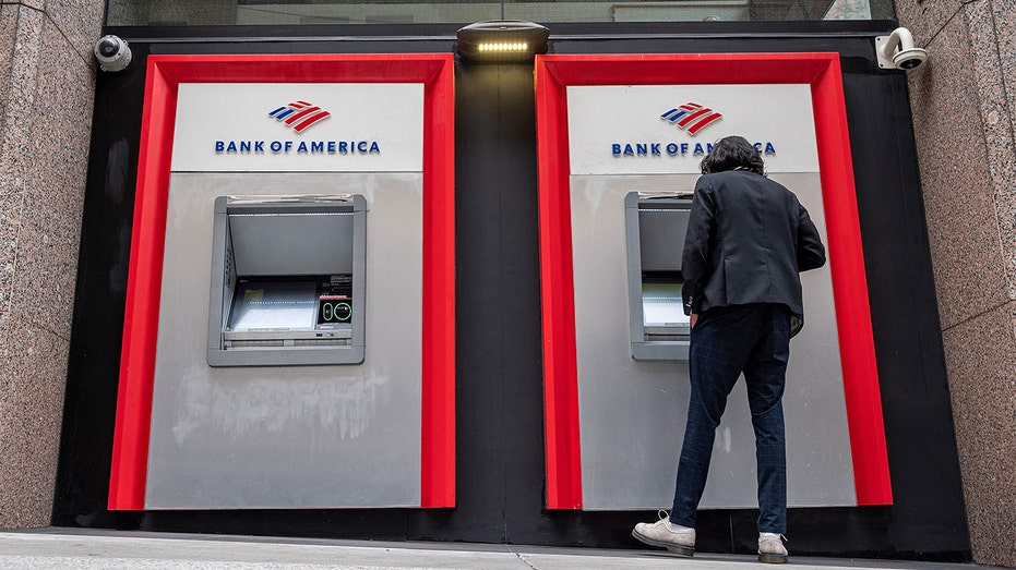 A customer using a Bank of America ATM 