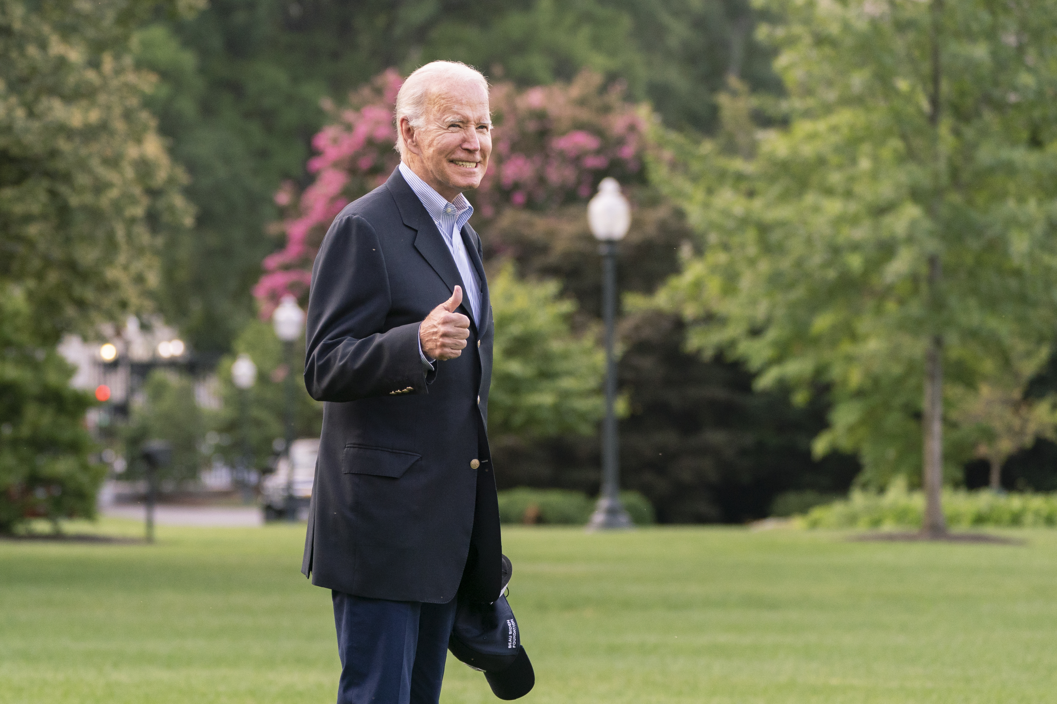 FILE - President Joe Biden walks to board Marine One on the South Lawn of the White House in Washington on his way to his Rehoboth Beach, Del., home, Sunday, Aug. 7, 2022. Democrats pushed their election-year economic package to Senate passage Sunday, a compromise less ambitious than Biden’s original domestic vision but one that still meets party goals of slowing global warming, moderating pharmaceutical costs and taxing immense corporations. (AP Photo/Manuel Balce Ceneta, File)