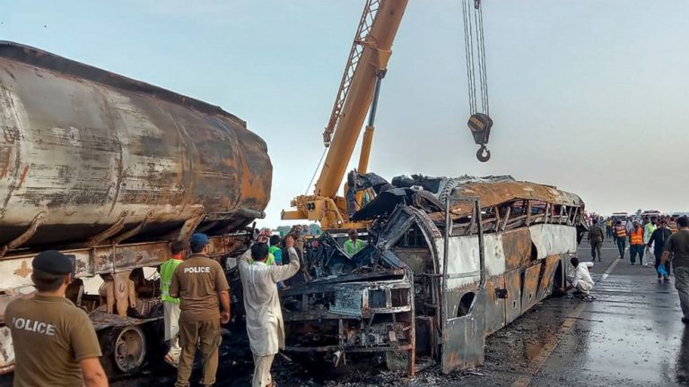 Bus rams into fuel truck in eastern Pakistan, killing 20
