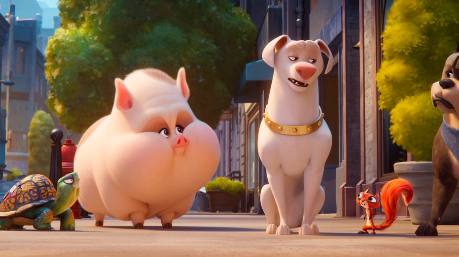 An animated turtle, pig, squirrel and two dogs have a conversation in the 'DC League of Super-Pets' movie 