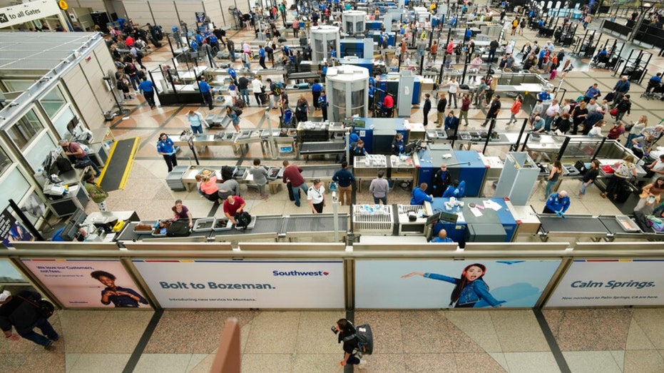 Travelers at Denver International Airport