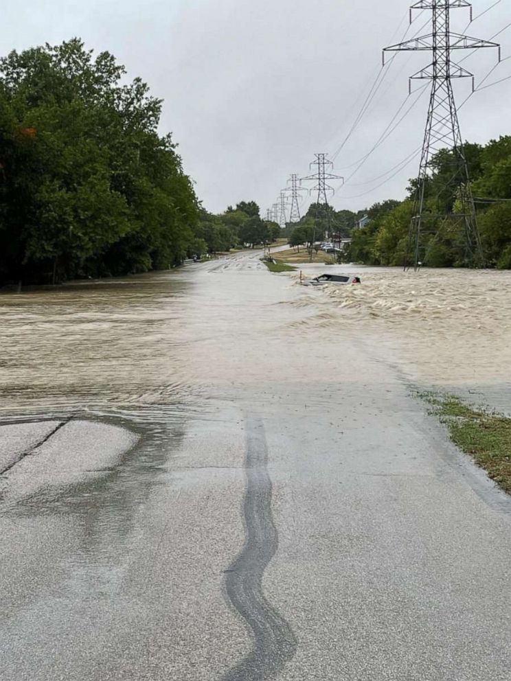 PHOTO: A car floats in a flooded road in the Glenview at Big Fossil Creek area in Texas, in an image provided by the City of North Richland Hills via Twitter.