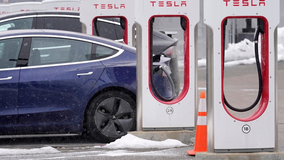 Tesla at charging station 