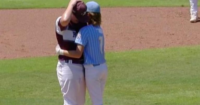 Little league baseball player comforts pitcher who hit him in the head