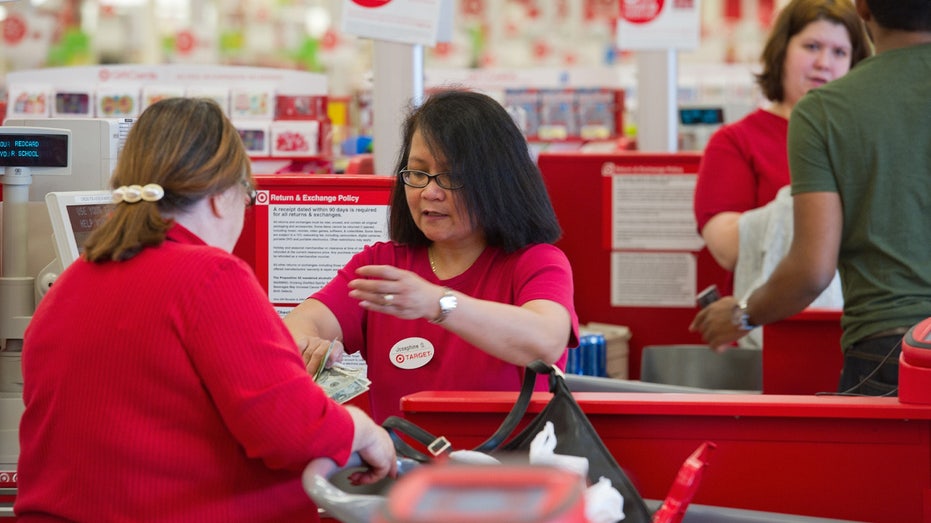 A cashier helps a customer at a California Target store