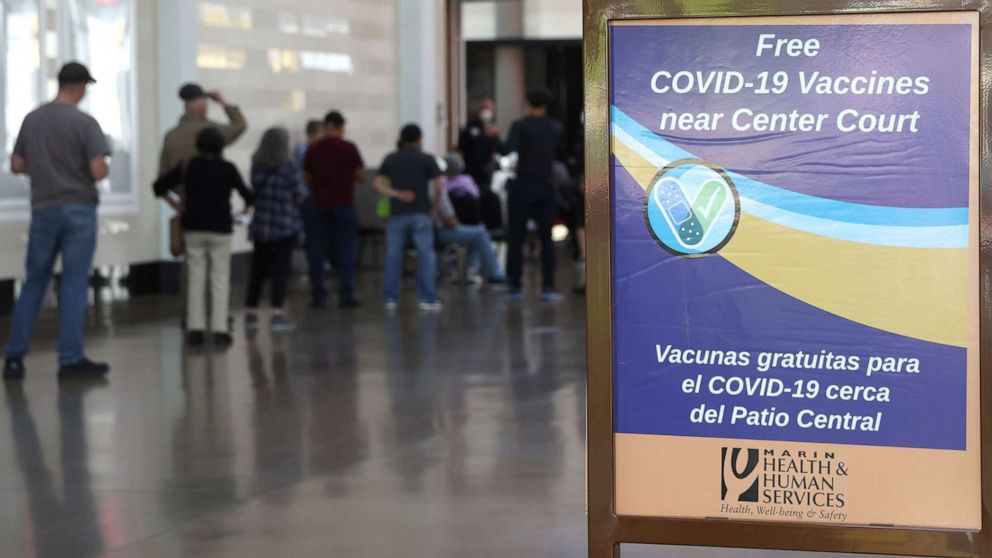 PHOTO: People line up for a COVID-19 vaccine at a clinic in San Rafael, Calif., April 6, 2022.