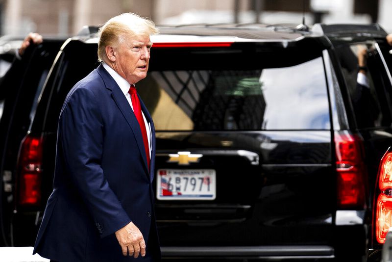 Former President Donald Trump departs Trump Tower, Wednesday, Aug. 10, 2022, in New York, on his way to the New York attorney general's office for a deposition in a civil investigation. (AP Photo/Julia Nikhinson)AP