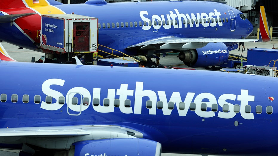 Southwest Airlines planes parked at a gate