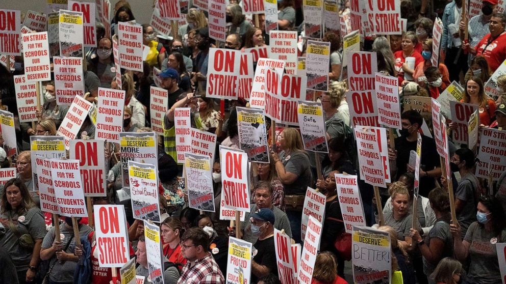 PHOTO: Columbus teachers union members stream out of the convention center after voting to strike, Aug. 21, 2022, in Columbus, Ohio.