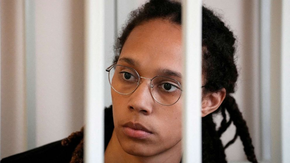 PHOTO: WNBA star and two-time Olympic gold medalist Brittney Griner sits in a cage at a court room prior to a hearing, in Khimki, Russia, July 27, 2022.