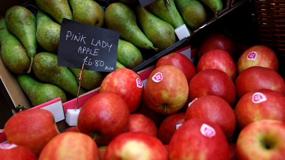 Conference pears and Pink Lady apples for sale