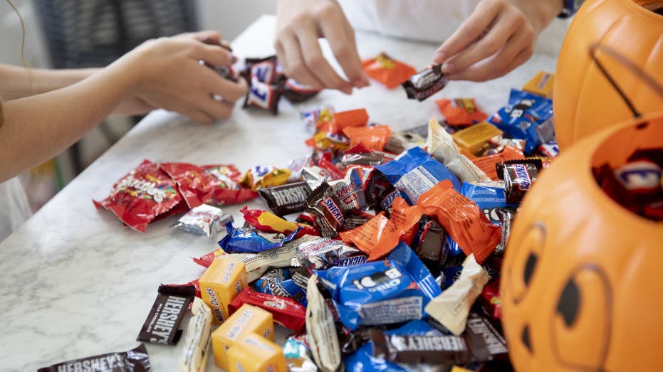 Kids sort through candy