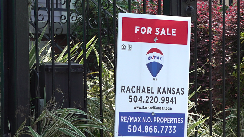 Close up shot of Remax for sale sign