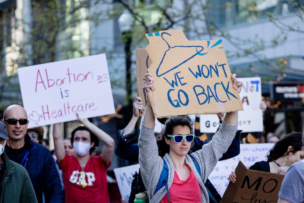 PHOTO: People march through 8th Street in response to the news that the U.S. Supreme Court could be poised to overturn the landmark Roe v. Wade case that legalized abortion nationwide in downtown Boise, Idaho, on May 3, 2022.