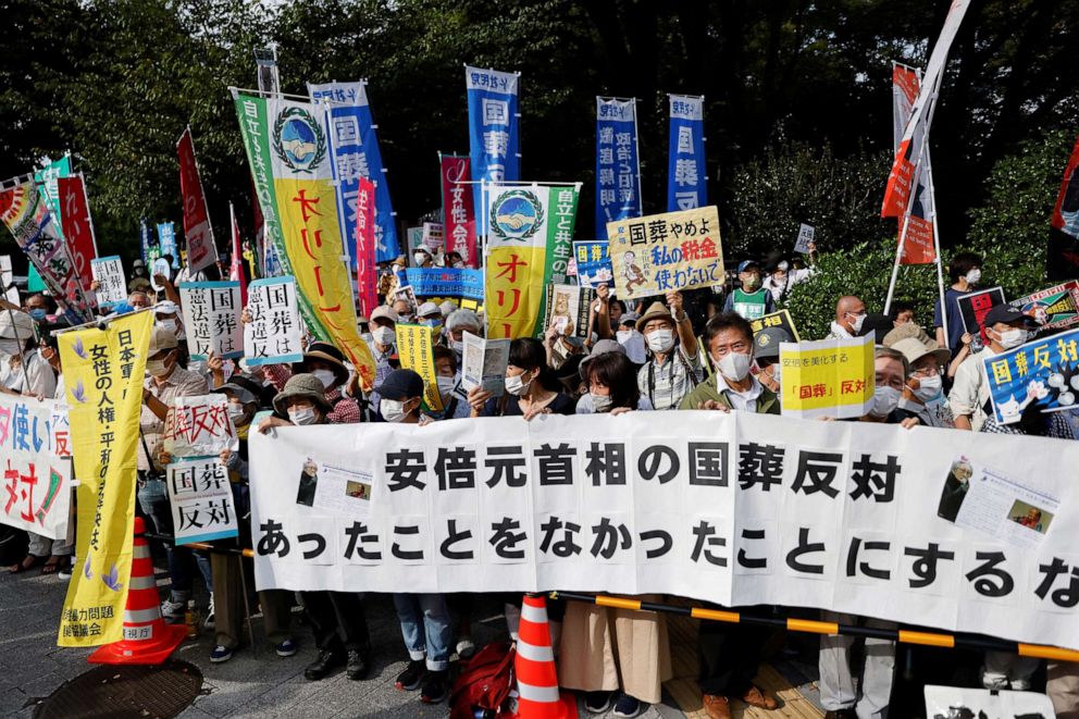 PHOTO: Protesters attend a rally outside the parliament building against Japan's state funeral for former Prime Minister Shinzo Abe, in Tokyo, Sept. 27, 2022.