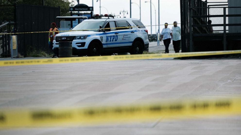 PHOTO: Police work along a stretch of beach at Coney Island which is now a crime scene after a mother is suspected of drowning her children in the ocean on Sept. 12, 2022, in the Brooklyn, New York.