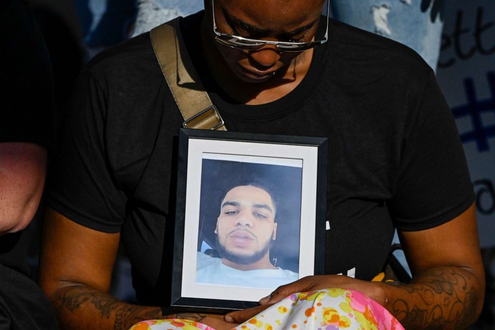 PHOTO: A photo of Donovan Lewis is displayed during a rally at the Columbus Division of Police Headquarters in Columbus, Ohio, Sept. 2, 2022.