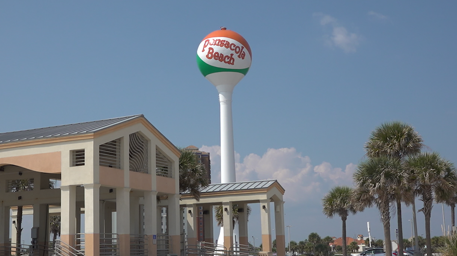 View of the Pensacola beach gazebo with the water tower pensacola beach ball in the distance