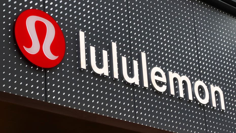 A Lululemon logo on a storefront