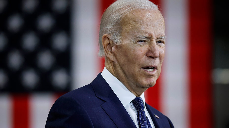 Biden in front of an American flag