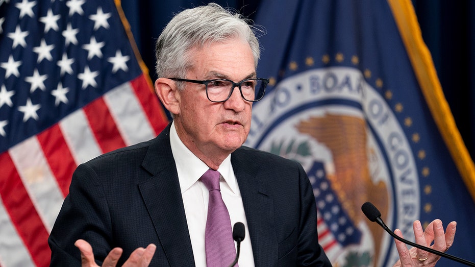 Fed Chairman Jerome Powell speaking while gesturing with his hands