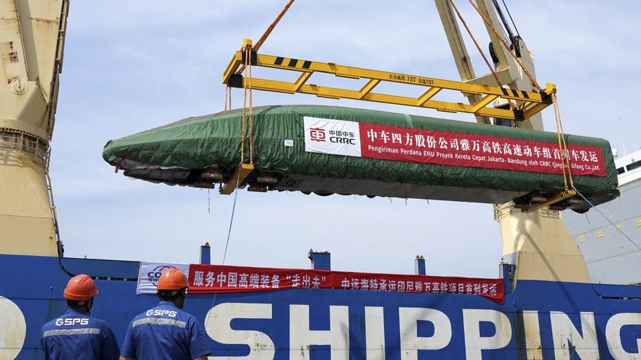 Train being unloaded from Chinese ship