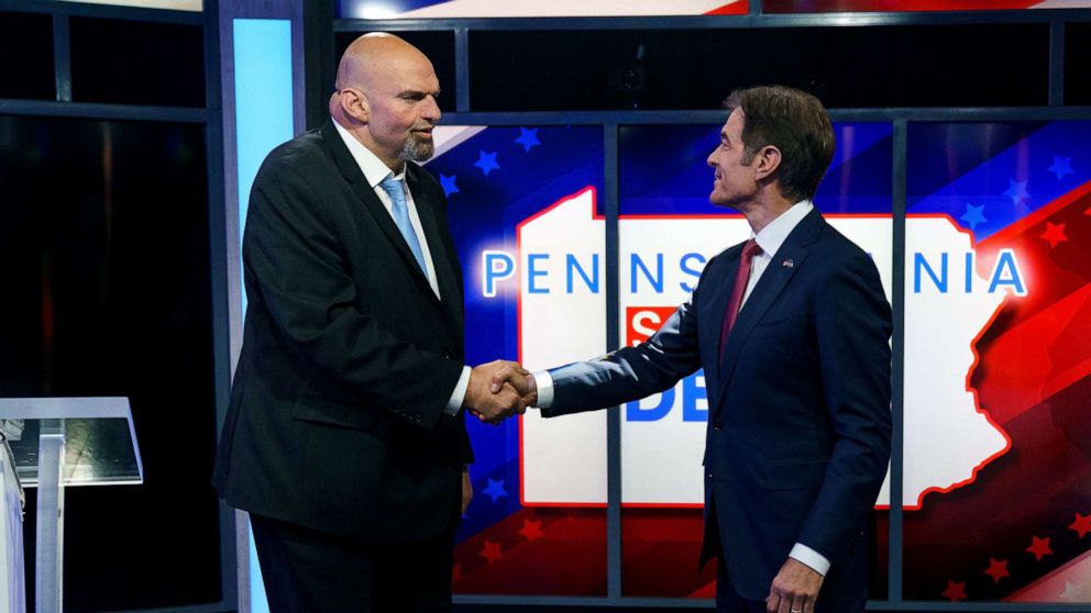 PHOTO: A handout photo made available by abc27 shows Democratic candidate Lt. Gov. John Fetterman (L) and Republican Pennsylvania Senate candidate Dr. Mehmet Oz (R) shaking hands prior to their debate in Harrisburg, Penn., Oct. 25, 2022.