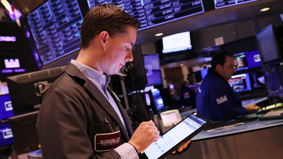 Traders on the floor of NYSE