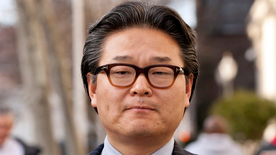 Bill Hwang, founder of Tiger Asia Management LLC, exits federal court in Newark, New Jersey, Wednesday, Dec. 12, 2012. (Emile Wamsteker/Bloomberg via Getty Images)