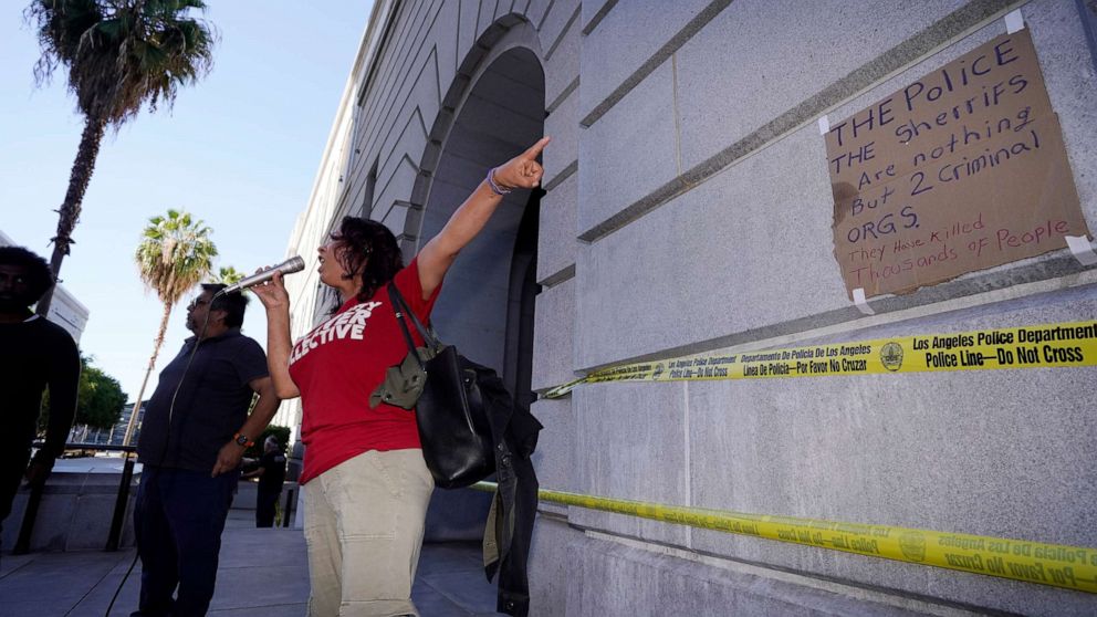 PHOTO: Citizens protest at the entrance of Los Angeles City Hall, Oct. 19, 2022, in Los Angeles.