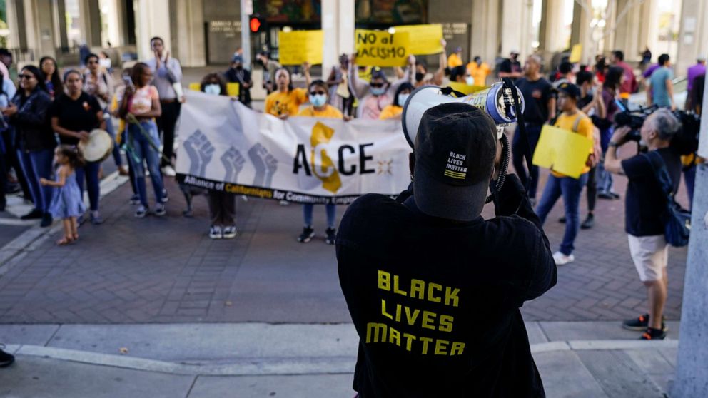 PHOTO: Protesters chant a slogan outside the Los Angeles City Hall in Los Angeles, Oct. 18, 2022.