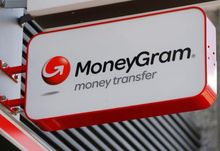 Motor racing-Haas lands MoneyGram as title sponsor