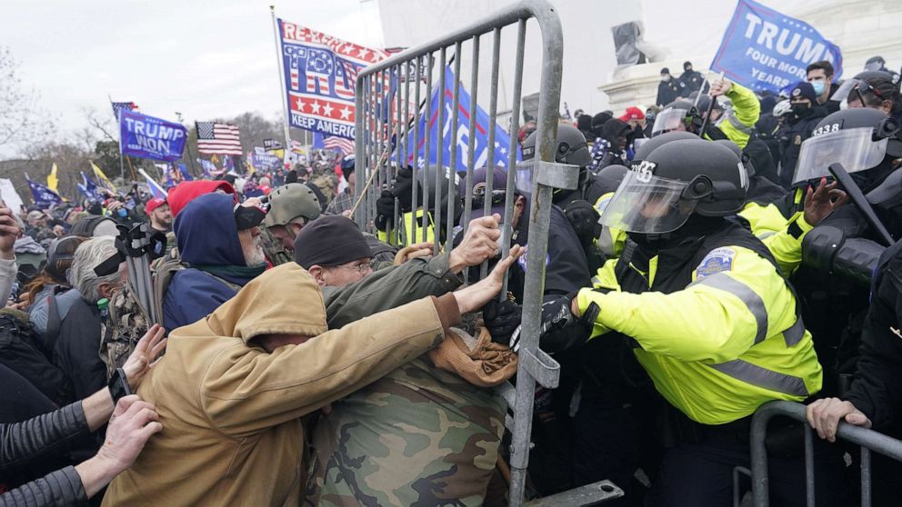 PHOTO: Protesters clash with police outside the U.S. Capitol, Jan. 6, 2021 in Washington.