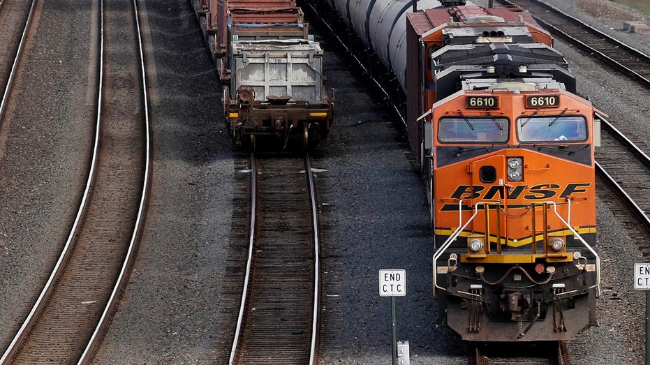 A freight train parked in rail yard