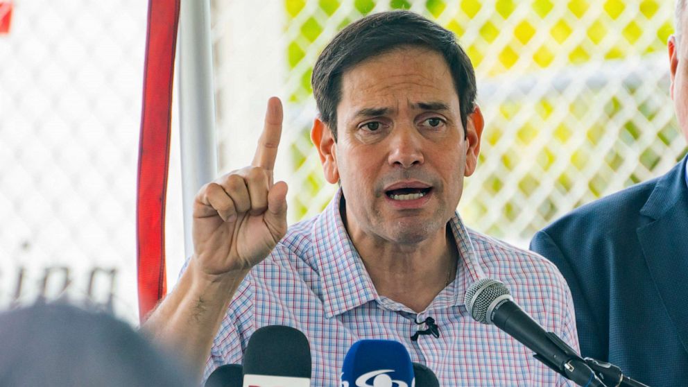 PHOTO: Sen. Marco Rubio reacts to a speaker on the first day of voting in Miami, Oct. 24, 2022. 