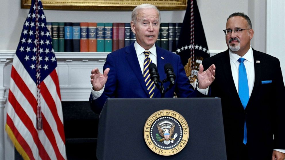 PHOTO: President Joe Biden announces student loan relief with Education Secretary Miguel Cardona, in the Roosevelt Room of the White House, in Washington, D.C., Aug. 24, 2022.