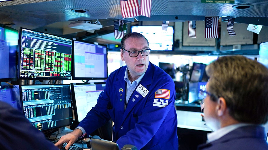 Traders on the floor of the New York Stock Exchange