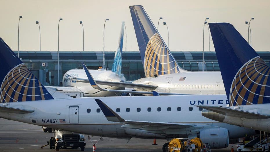 Parked planes at terminal