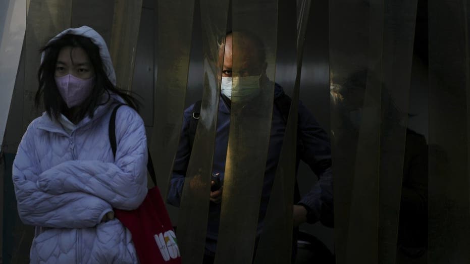 Commuters in Beijing