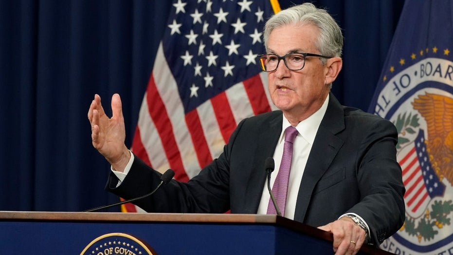 Federal Reserve Chairman Jerome Powell speaking while gesturing with his hand