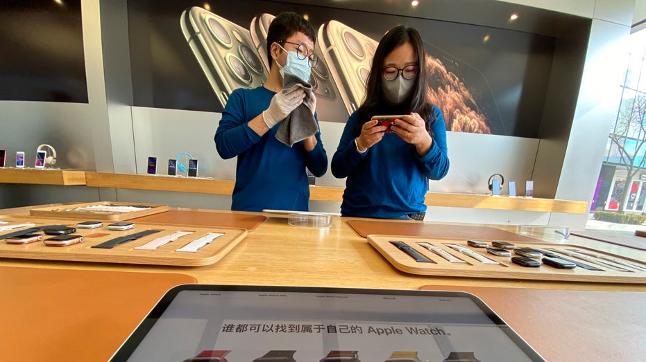 Apple store employees in masks