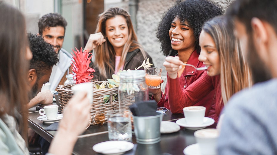 happy people dining together