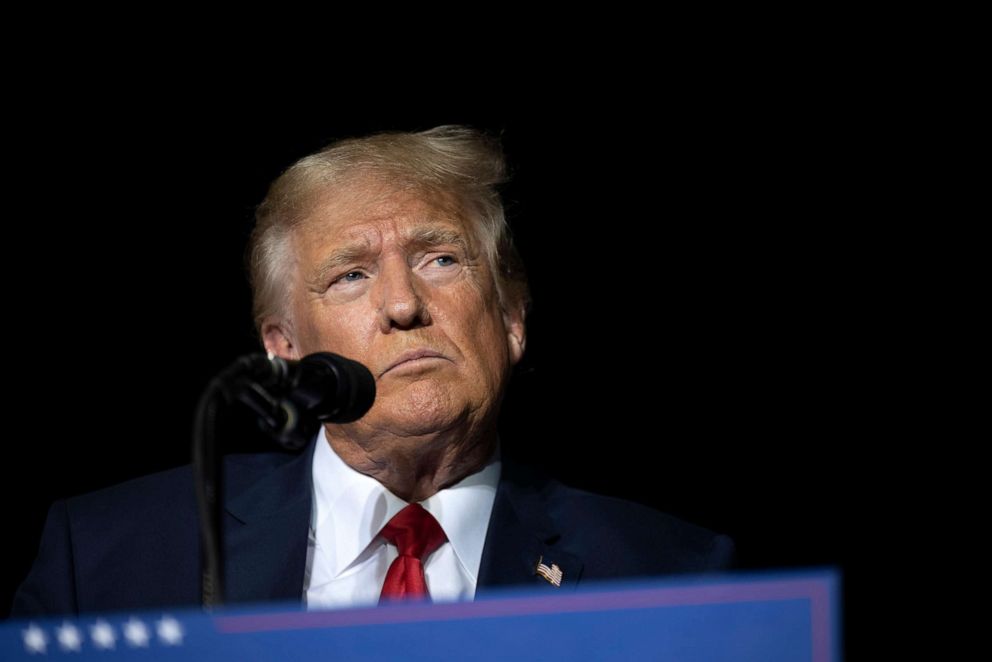 PHOTO: Former President Donald Trump pauses while speaking at a rally at the Minden Tahoe Airport in Minden, Nev., on Oct. 8, 2022.