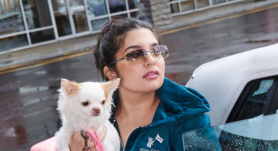 woman and dog in juicy couture