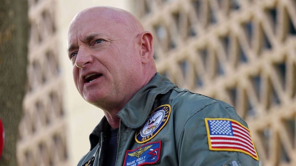 PHOTO: U.S. Sen. Mark Kelly speaks at a press conference outside the Arizona State Capitol on Nov. 7, 2022, in Phoenix, Ariz.