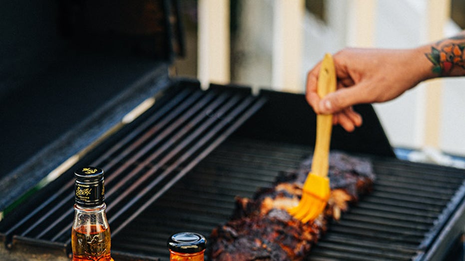 Sailor Jerry bbq sauce on grill