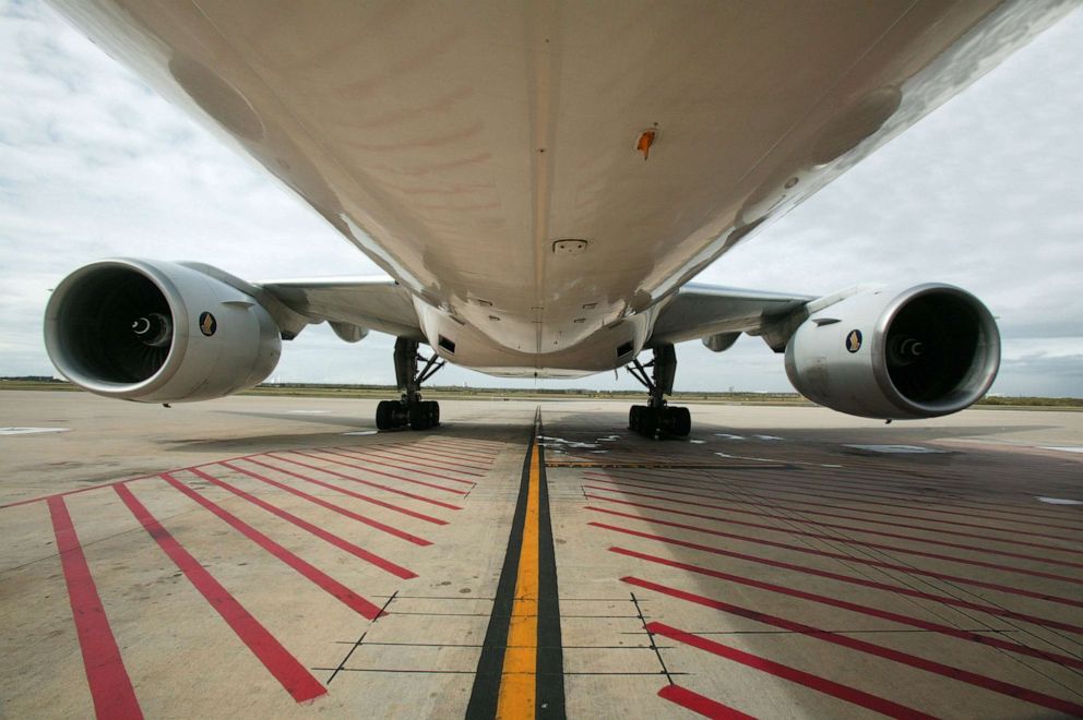 PHOTO: The underbelly of an aircraft on the runway.
