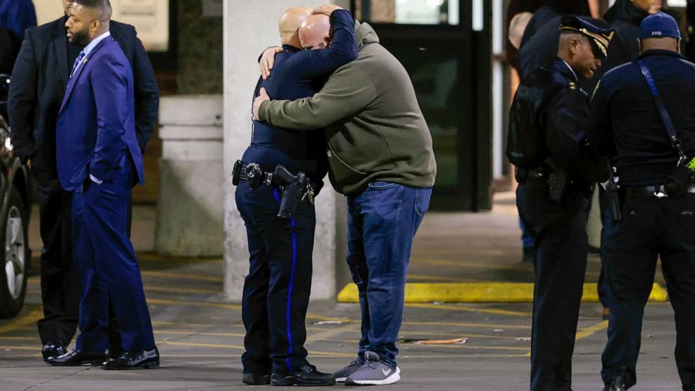 PHOTO: Police gather at Temple University Hospital following a fatal shooting of a Temple University police officer near the campus, Feb. 18, 2023, in Philadelphia.