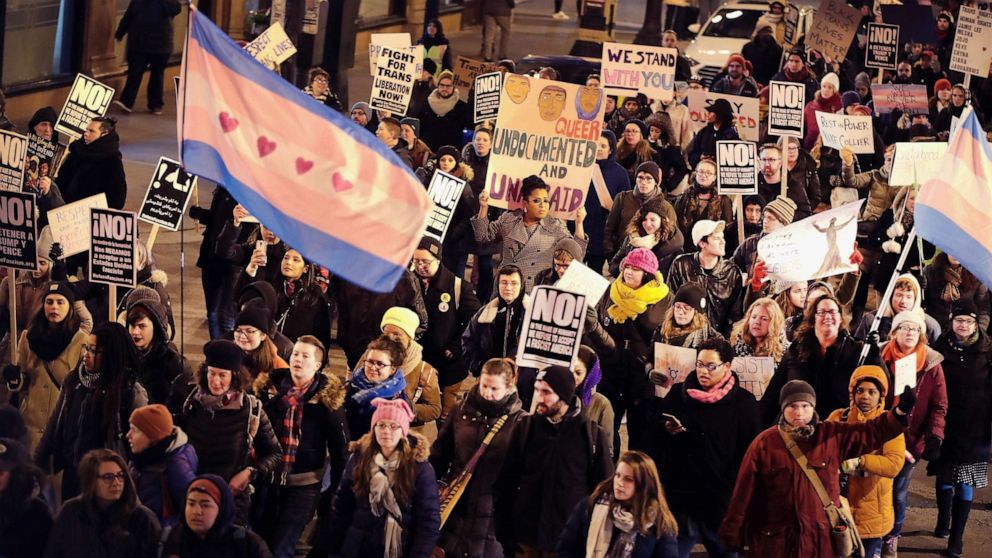 PHOTO: Demonstrators for transgender rights march and hold a candlelight vigil to remember transgender friends lost to murder and suicide, March 3, 2017, in Chicago.